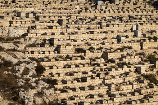 Vast Jewish cemetery on Jerusalem's hillside, a symbol of enduring respect and tradition