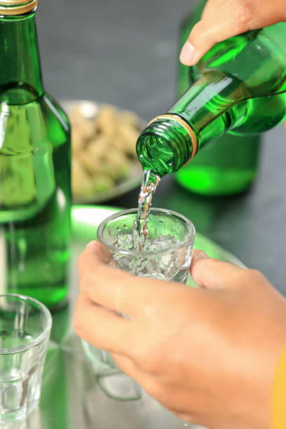 istock Close Up Pouring Soju to the Sloki 1954456805