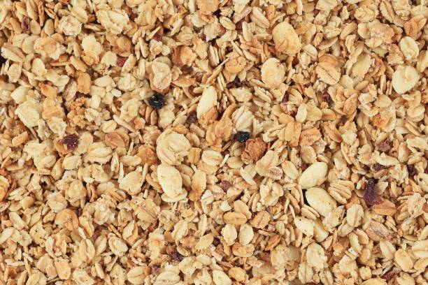 istock Muesli Breakfast with Oatmeal Cereals and Dry Fruit Raisins. 1954458518