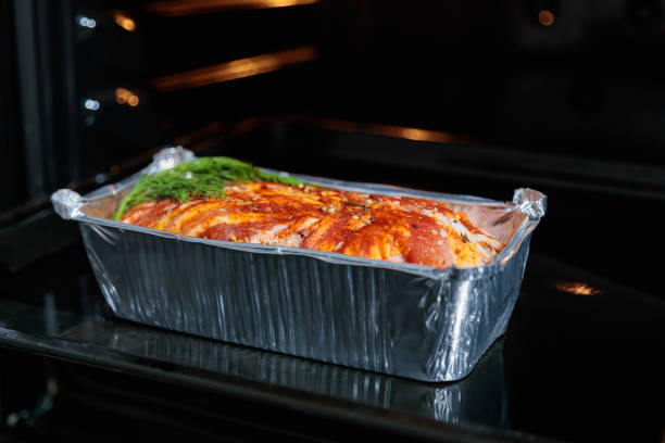 istock Roasting meatloaf in the oven 1954459100