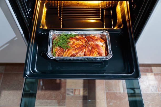 istock Roasting meatloaf in the oven 1954459103