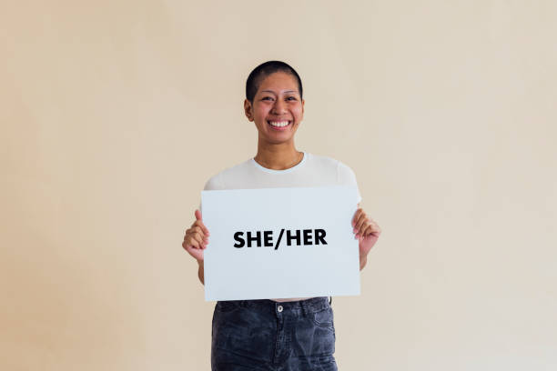 istock Holding a Pronoun Sign 1954460787