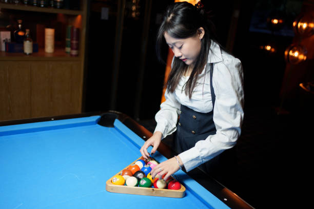 istock Asian woman preparing for billiards 1954464599