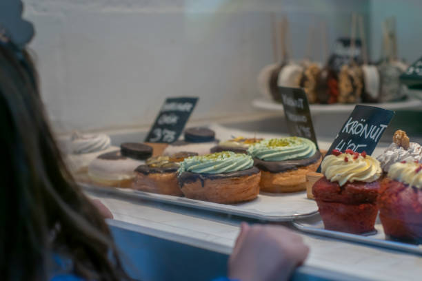 istock Reflection of Delights: Pastry Showcase Through Curious Eyes 1954465181