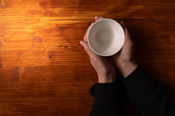 istock person with coffee cup 1954466789