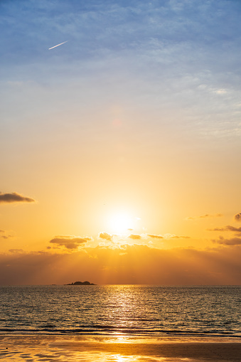 Sunset, sunset beach scenery - contrails