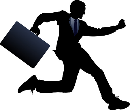 Businessman running silhouette.