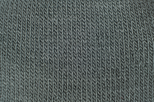 Pattern and texture of synthetic acrylic fabric close-up macro
