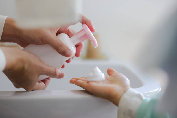 istock Close up Face wash foam on hands 1954600957