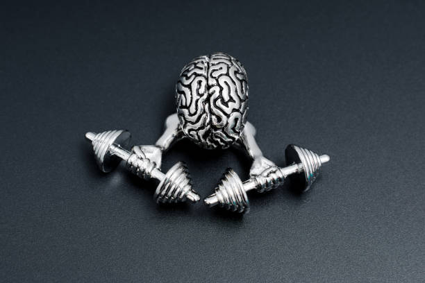 istock Mindful Strength: Human Brain Lifting Heavy Dumbbells 1954613019