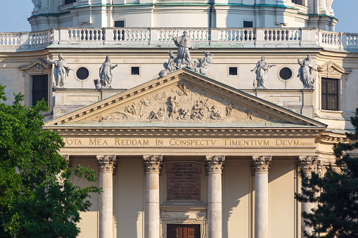 Detail of the ornate facade of Karlskirche in Vienna, Austria