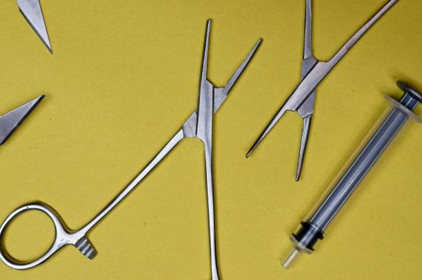 istock Medical tools on yellow paper 1954652417