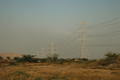 The mesmerising sight of power lines extending across the desert landscape in Baluchistan state, Pakistan