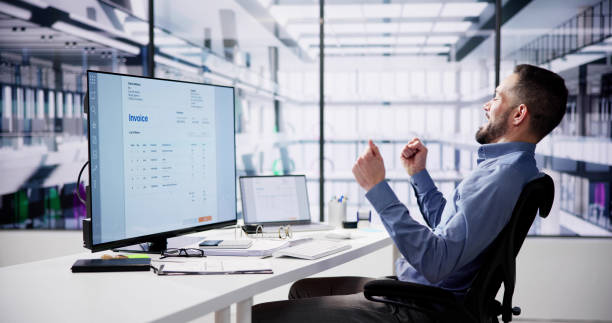 istock Happy Businessman Raising His Hand 1954710289