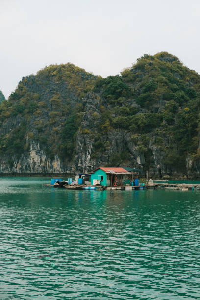 A floating wooden house in Halong Bay, Vietnam
