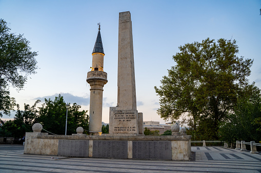 View of Gaziantep Martyrs Monument (Sehitler Abidesi) and a minaret of mosque. Gaziantep, Turkey - December 4, 2023.