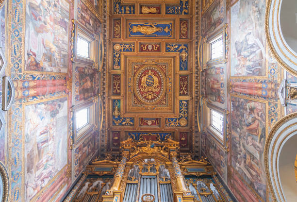 Rome, Italy - August 9, 2025: Church of Santa Maria ai Monti built - in the 16th century - after a miraculous healing of a blind woman by the icon of the Madonna placed in that spot. In this photo, the evangelist St Mark represented by lion. Painted by Ilario Casolani (1588-1661).