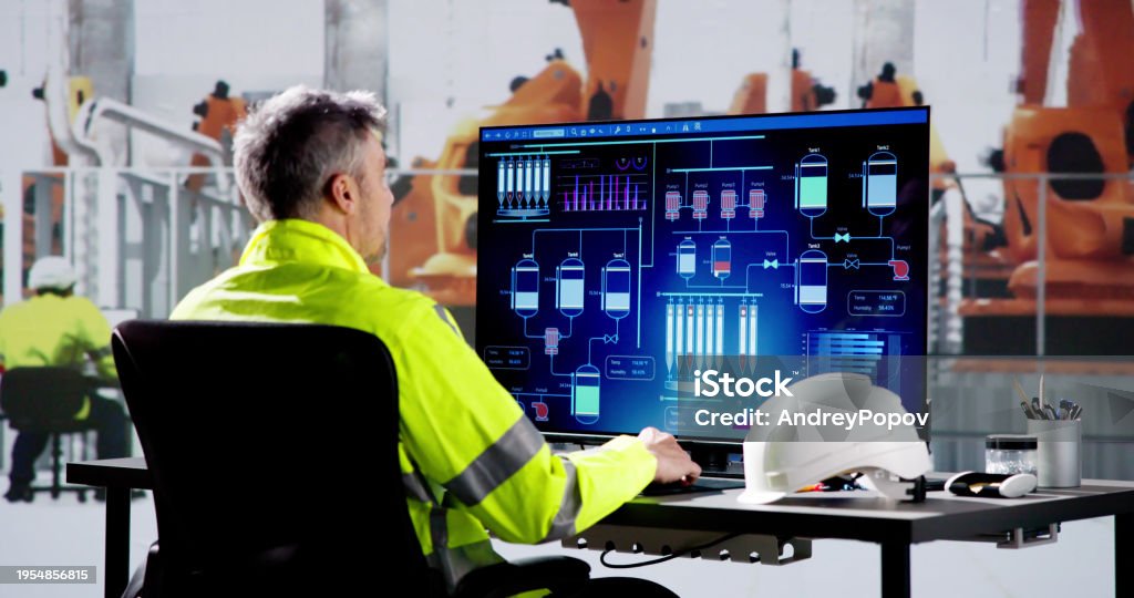 Engineer Operator Using Scada System Stock Photo - Download Image Now ...