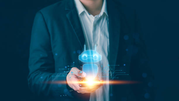 istock Business man uses Smart phone to access artificial intelligence technology, Robot AI concept in computer software, Internet network communication to create AI learning. 1954905646