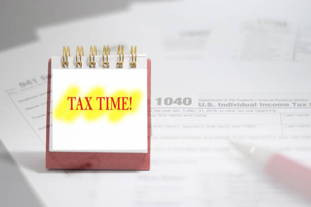 Tax time concept blank form with calculator. Accountant