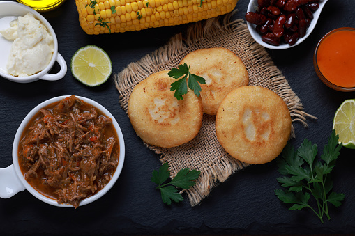 Arepa with shredded beef and corn