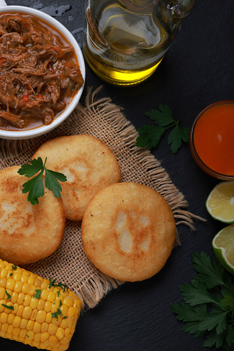 Arepa with shredded beef and corn