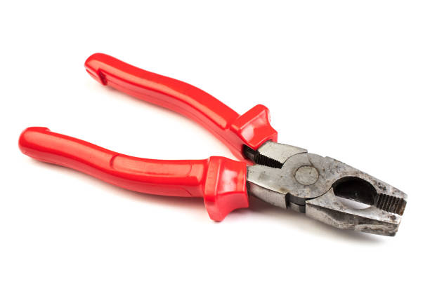 istock pliers red and black color on white background. Top view. 1954950168