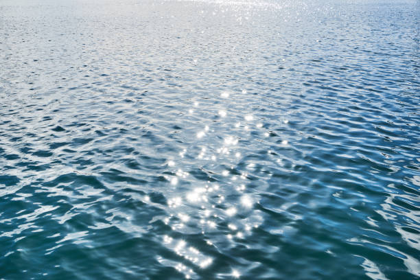 istock Sea waves and sun glare 1954956942
