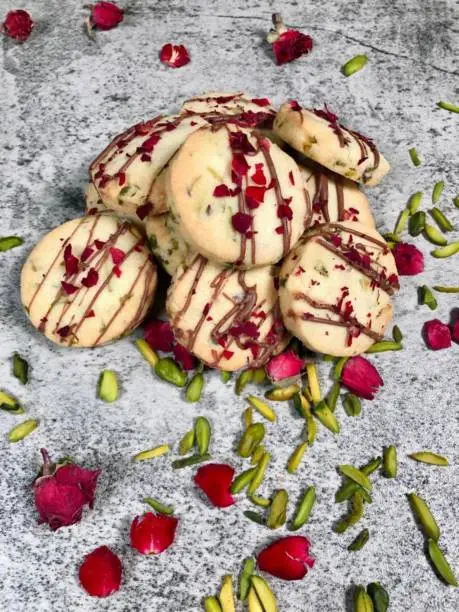 Rose and pistachio cookies bring a Middle Eastern-inspired twist to your baking. The floral notes of rosewater complement the earthy taste of pistachios, creating a sophisticated and flavorful cookie. Consider adding a sprinkle of chopped pistachios for extra texture.