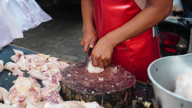 istock Cut the chicken meat on a cutting board 1954984227