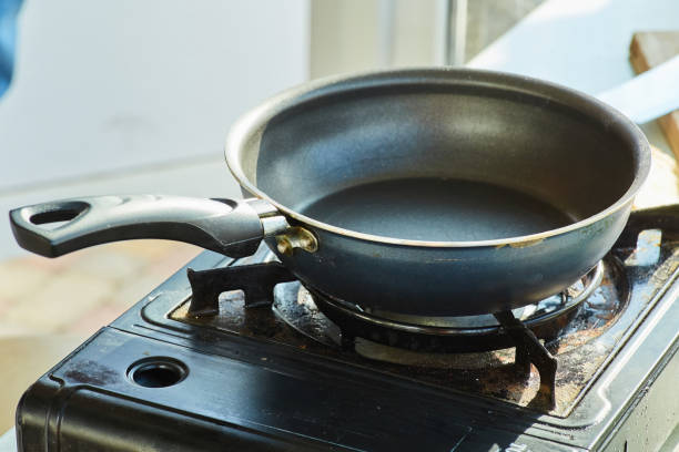 istock A frying pan on the stove. The cooking process 1955008129