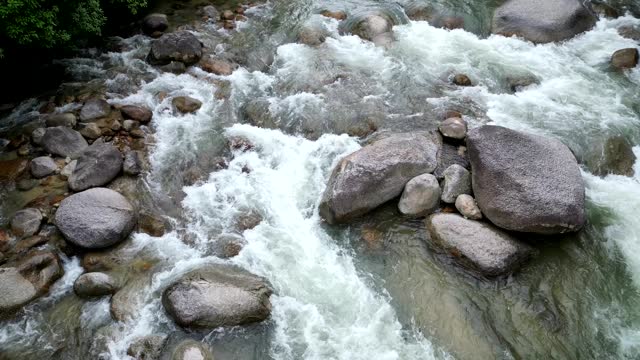 Intricate dance of water and rock, serene masterpiece.