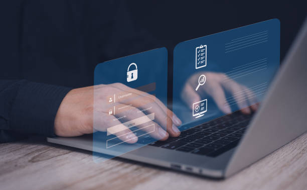 istock cybersecurity or internet access security concept : Business man use his finger to touching or pressing the virtual screen to lock or unlock important data on laptop using computer security system. 1955026698