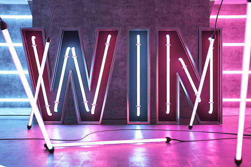 Big Win Neon Sign with Fluorescent Light in a Futuristic Room. 3D Render