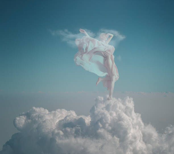 istock woman in the clouds 1955043023