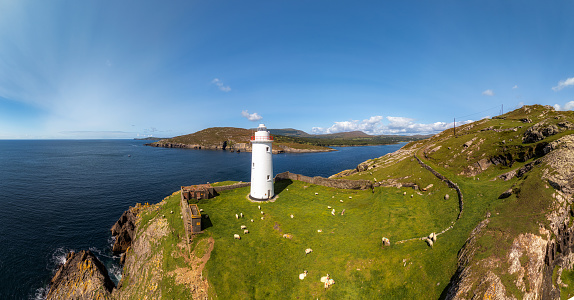 The Ardnakinna Lighthouse is located on Bere Island, which is part of County Cork, Ireland. It sits on the southeastern tip of the island, overlooking Berehaven Harbor. The lighthouse was established in 1847