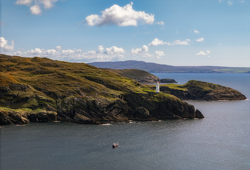 The Ardnakinna Lighthouse is located on Bere Island, which is part of County Cork, Ireland. It sits on the southeastern tip of the island, overlooking Berehaven Harbor. The lighthouse was established in 1847