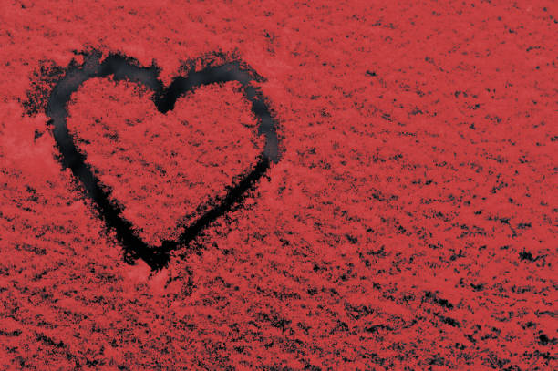 istock a heart on a red textured background. concept 1955066739