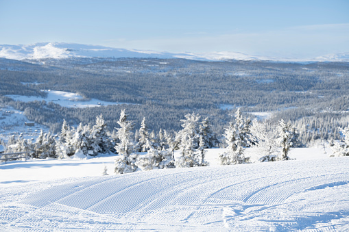 View from a ski slope at Kvitfjell Alpine Ski Resort in Norway in winter (February). Kvitfjell is known for hosting the men's and women's alpine speed events at the 1994 Winter Olympics.