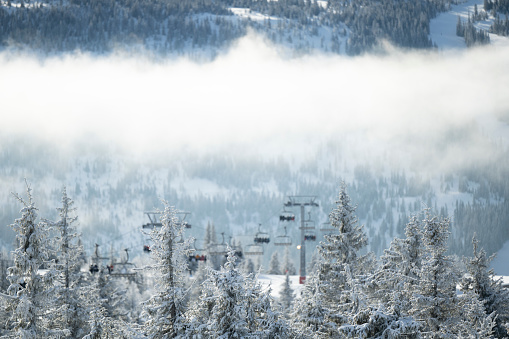 Scenic Whistler village with snowy Blackcomb mountain in background.