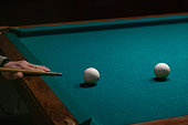 billiard balls on a table with green cloth, leisure activities, sports games