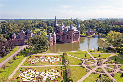 Haarzuilens, Netherlands - 08/21/2021: Aerial from historical castle De Haar near Utrecht in the Netherlands