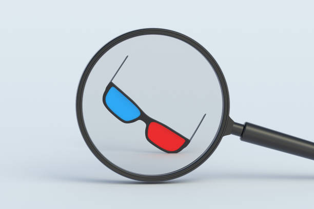 Cinema stereoscopic glasses behind magnifying glass. 3d render