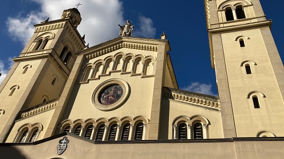 Santa Eduvigis catholic church in a suburb of Caracas city with blue sky and clouds