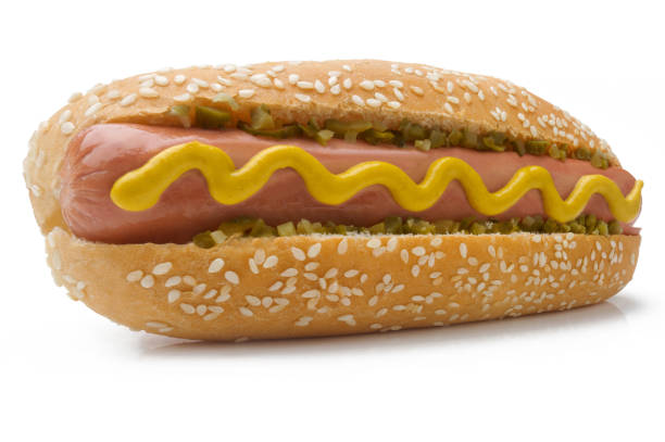 istock closeup of hot dog with mustard 1955136848