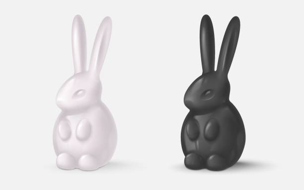 istock Realistic glossy black and white bunnies, rabbits. Symbol of 2023 year. Happy Easter poster. Vector illustration for card, party, design, flyer, decor, banner, web, advertising 1955150682
