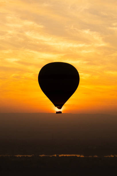 istock Hot balloon sunrise and temples in Luxor, egypt 1955161881