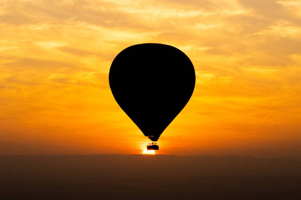 istock Hot balloon sunrise and temples in Luxor, egypt 1955161882