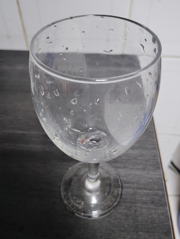 View of a broken shot glass.