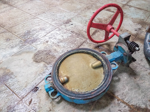 butterfly valve disassembled for maintenance. industrial equipment maintenance